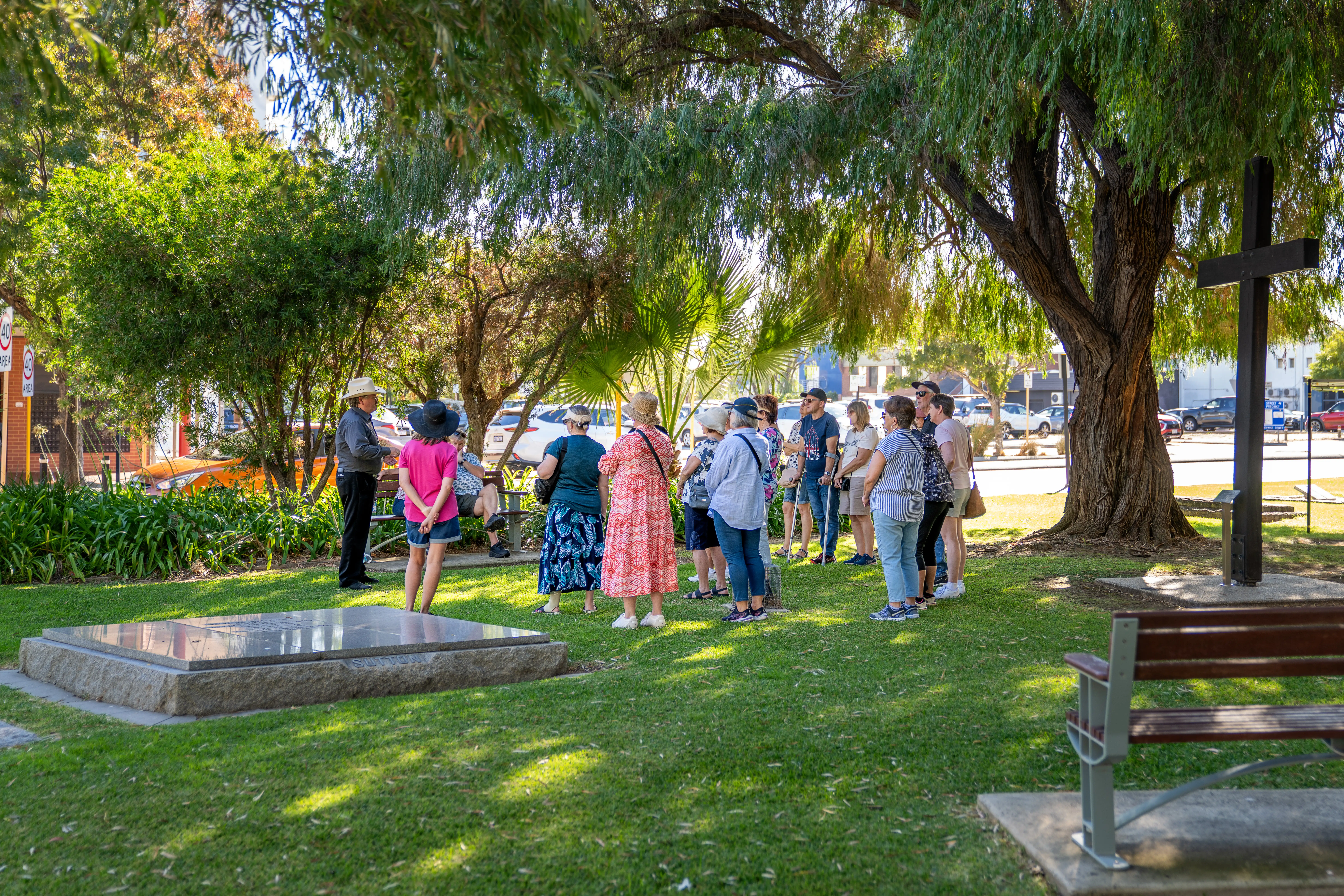 People in park on heritage walk.
